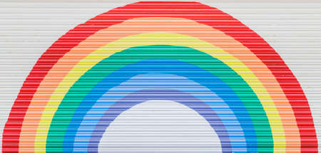 Rainbow motif on the shutters of an amusement arcade seen in Southport in March 2021 during the Covid 19 pandemic.のeditorial素材