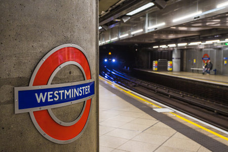 A train approaches Westminster tube station on the London underground in May 2022.のeditorial素材
