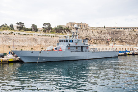 Offshore patrol vessel of the Armed Forces of Malta moored in port at Valletta in April 2022.のeditorial素材