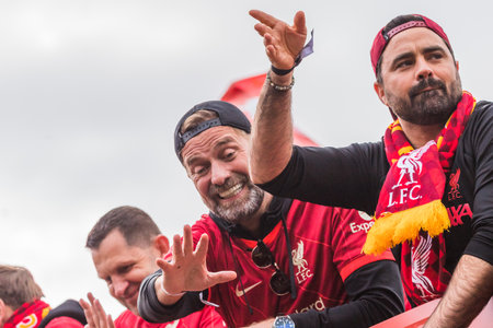 Jurgen Klopp celebrating during the 2022 winners parade through Liverpool in May 2022 having seen his team win the Carabao Cup and the FA Cup.のeditorial素材