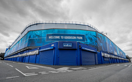 Looking up at the Goodison Park stadium, home of Everton Football Club in June 2022 at the junction of Gwladys Street and Bullens Road.のeditorial素材