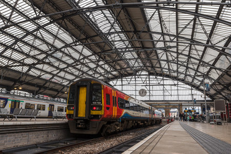 An EMR Regional train seen waiting by a platform at Liverpool Lime Street train station in December 2022.のeditorial素材
