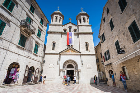 Tourists pictured mingling around the courtyard in front of the Church of St Nicholas in Kotor, Montenegro in June 2023.のeditorial素材