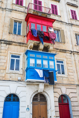 Colourful Maltese balconies seen in Valletta during May 2022.の写真素材