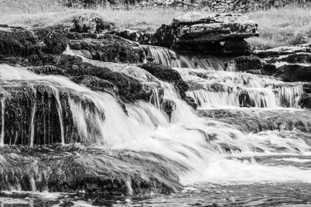 Water crashing over Raven Ray pictured on the Ingelton Waterfalls Trail in North Yorkshire.の写真素材