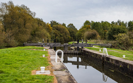 Looking up a canal lock at Appleby Bridge on the Leeds Liverpool canal seen in October 2022.の写真素材