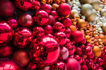 A festive wall of decorations and baubles pictured in the run up to Christmas in 2022.の写真素材