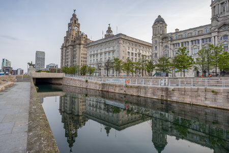 An HDR image of the Three Graces in Liverpool comprising the Royal Liver Building, Cunard Building and the Port of Liverpool Building.の写真素材