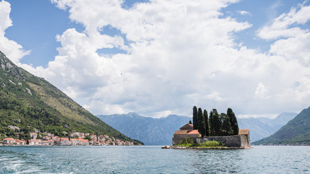 St George Island seen from a boat travelling on the Bay of Kotor in Montenegro during May 2023.の写真素材
