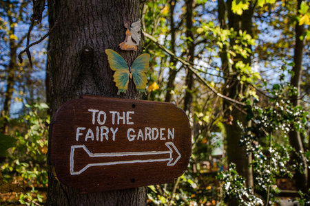 A sign sign on a tree at the entrance of Hadlow Fields fairy garden in Cheshire.の写真素材