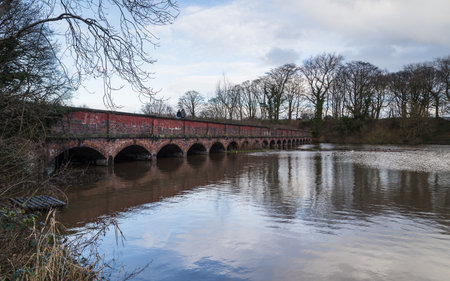 Nineteen Arches bridge spanning the Carr Mill Dam near St Helens in Merseyside.の写真素材