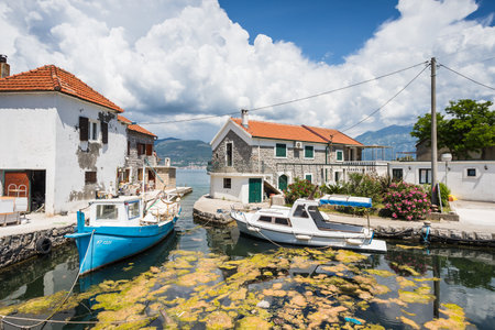 Small boats in the pretty village of Bjelila on the Montenegro coastline in May 2023.の写真素材