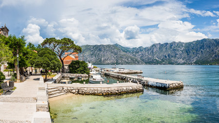 A multi image panorama of boats and break waters at Prcanj in the Bay of Kotor pictured in May 2023.の写真素材