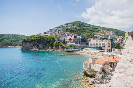 Budva Old Town and beaches pictured high up on the city walls in Montenegro during May 2023.の写真素材