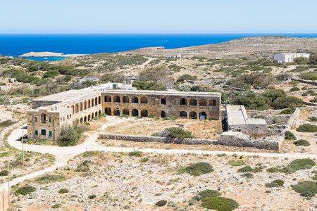 Looking down on an abandoned Isolation Hospital in Comino during April 2022 in Malta.の写真素材