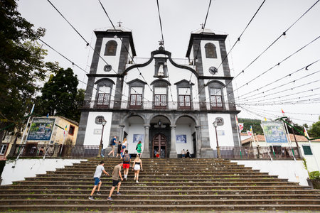 Looking up at tourists approaching the Nossa Senhora do Monte Church in Monte near Funchal, Madeira on 31 July 2024.の写真素材