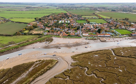 An aerial view of the channels and creeeks in front of Burnham Overy Staithe on the North Norfolk coast seen at low tide.の写真素材