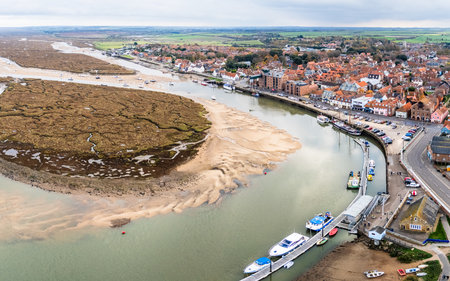 A multi image panorama captured above the harbour and town of Wells next the Sea on the North Norfolk coast on 7 November 2025.の写真素材