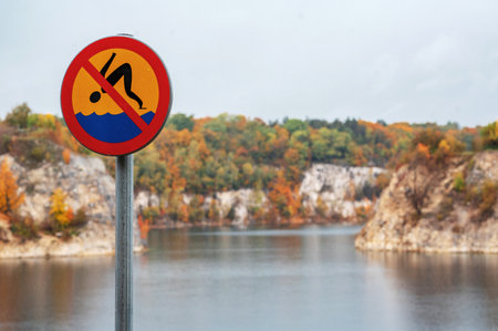 No swimming sign on the bank of the Dniester riverの写真素材