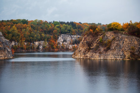 Autumn landscape with colorful forest and lake. Colorful autumn trees on the shore.の写真素材