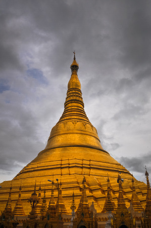 Shwedagon Pagoda shining in the beautiful sunset in Yangon, Myanmar (Burma)の写真素材