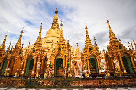 Shwedagon Pagoda Temple shining in the beautiful sunset in Yangon, Myanmar (Burma)  the beautiful golden pagoda, the oldest historical pagoda in Burma and the world, in the evening with great evening light.のeditorial素材