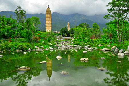 Rebuild Song dynasty town in dali, Yunnan province, China  Three pagodas and water with reflectionの写真素材