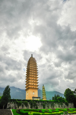 Rebuild Song dynasty town in dali, Yunnan province, China. Three pagodas and water with reflectionの写真素材