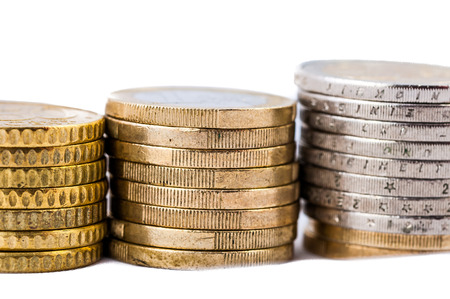 Euro Coins closeup on a white background finance concept