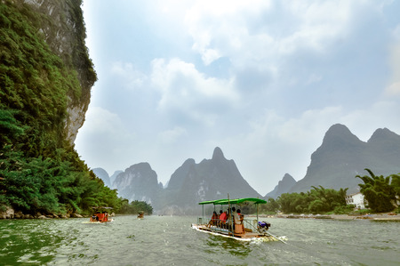 Beautiful Li river bamboo side Karst mountain landscape in Yangsの写真素材
