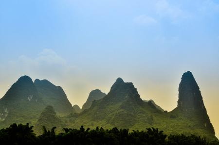 Beautiful Li river bamboo side Karst mountain landscape in Yangsの写真素材