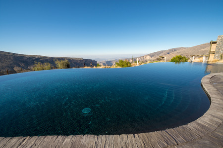 Pool Omani Mountains at Jabal Akhdar in Al Hajar Mountains, Oman at sunset.の写真素材