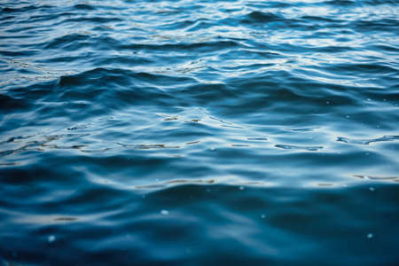 lake ripples and mountainsの写真素材
