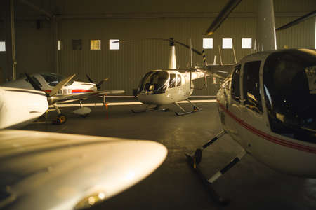 Helicopter parked in hangarの写真素材