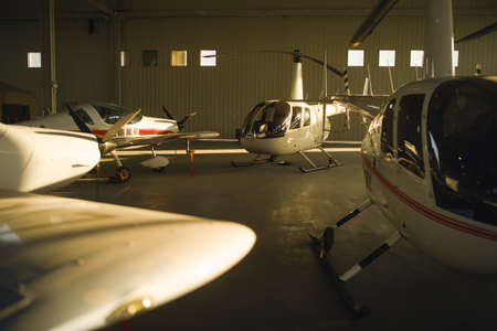 Helicopter parked in hangarの写真素材