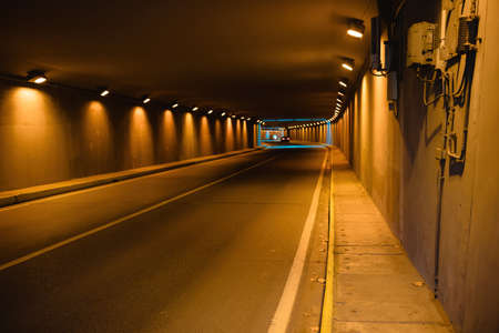 tunnel under blue lightの写真素材
