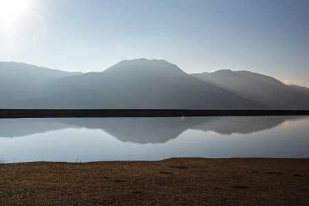 Reflection of mountains in the lake at sunset, Ladakh, India
