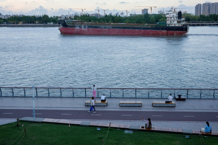 Bulk cargo ship sailing on the Volga River, Moscow, Russiaの写真素材