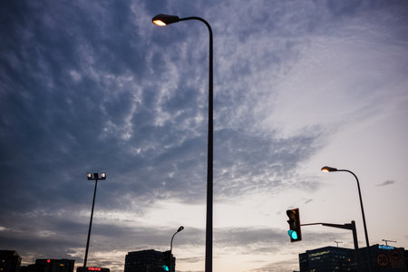 Silhouette of a street lamp against the background of the evening skyの写真素材