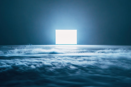 Surface of the ocean at night with light from the open doorの写真素材
