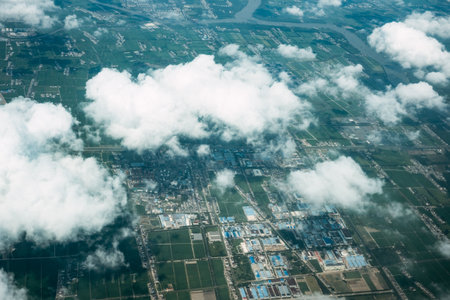 Aerial view of the city from airplane window. Cloudscape.の写真素材