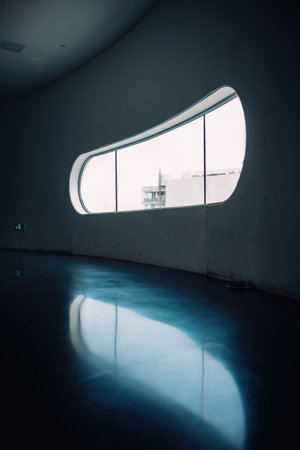 interior of modern building with white walls and blue floor, perspective