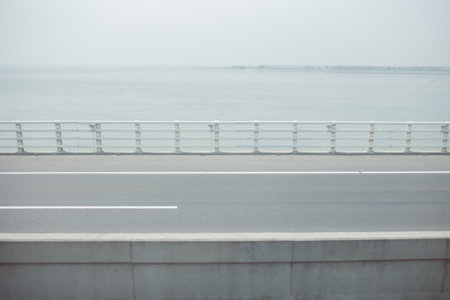 empty concrete road on foggy day with copy space for your textの写真素材