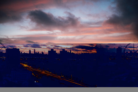 Cityscape at sunset. Silhouette of a modern city at sunset.