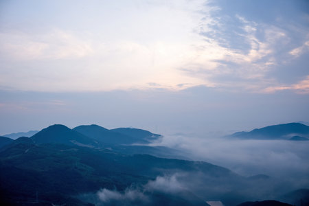 Mountain landscape with fog in the morning. Mountain scenery with fog in the morning.の写真素材
