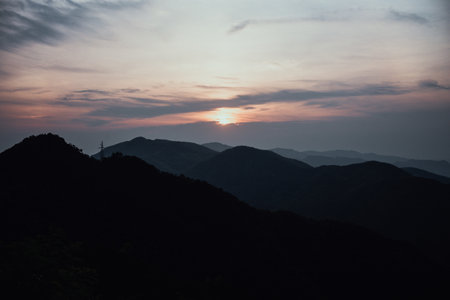 Sunset over the mountains in the winter, Doi Inthanon National Park, Chiang Mai, Thailandの写真素材