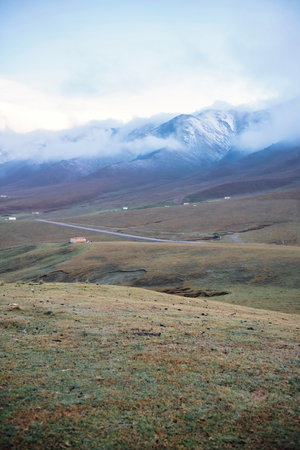 Mountains in the clouds, Kyrgyzstan, Dzhuku Valleyの写真素材