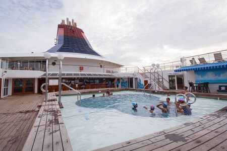 Swimming pool area in a Star Cruiseの写真素材