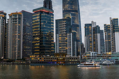 Cruise docked by Chinese Upper Class Residenceのeditorial素材