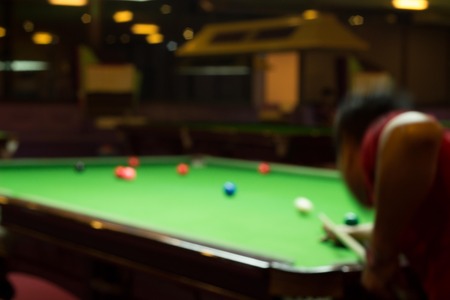 blur man playing snookerの写真素材